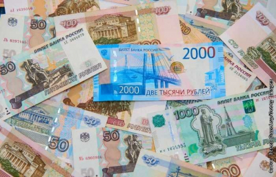 Рубль утром незначительно ослабевает к юаню после окончания июньского налогового периода